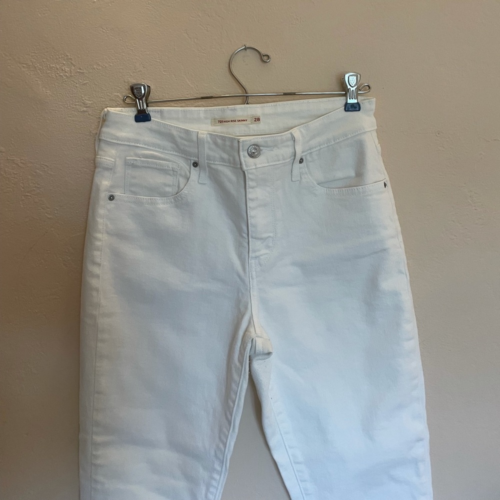 Levi’s 721 white jeans